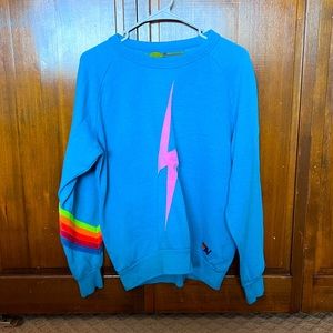 Aviator Nation light blue crewneck sweatshirt, lightning bolt, rainbow sleeve